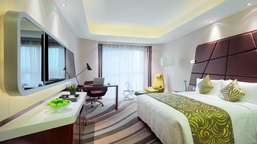 Imagen de la habitación del Hotel Maximilian Beijing. Foto 7