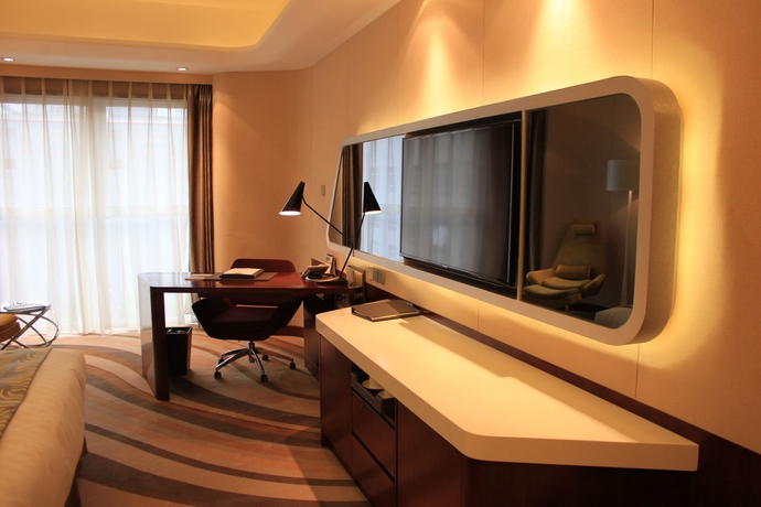 Imagen de la habitación del Hotel Maximilian Beijing. Foto 8