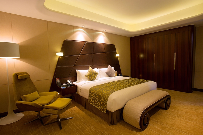 Imagen de la habitación del Hotel Maximilian Beijing. Foto 9