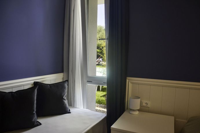 Imagen de la habitación del Hotel Maximilian, Cisano. Foto 11