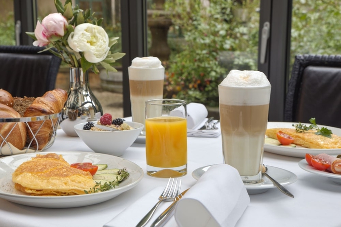 Imagen del bar/restaurante del Hotel Maximilian Munich Apartments and. Foto 3