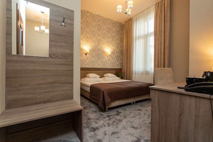 Imagen de la habitación del Hotel Maximum. Foto 10