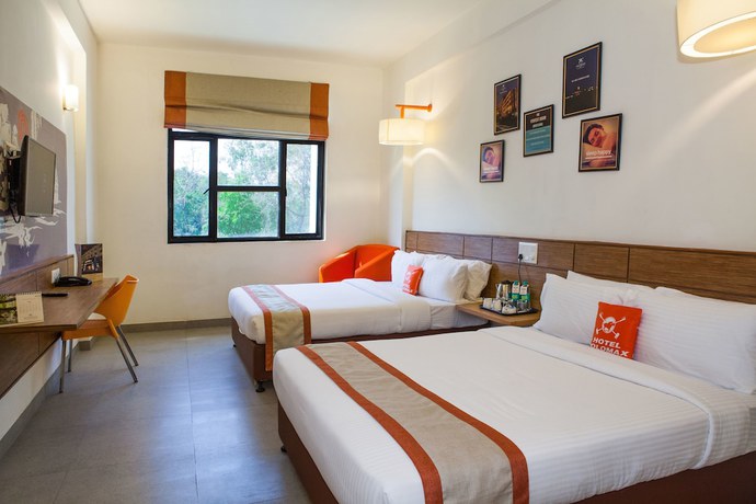 Imagen de la habitación del Hotel Maxs Jabalpur. Foto 14