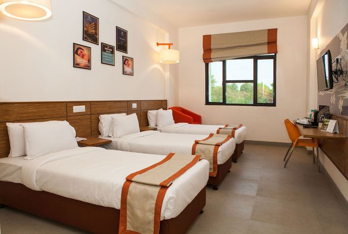 Imagen de la habitación del Hotel Maxs Prayagraj. Foto 9