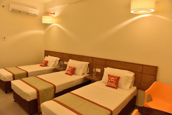 Imagen de la habitación del Hotel Maxs Prayagraj. Foto 12