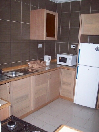 Imagen de la habitación del Hotel Maxwell Court Apartments. Foto 11