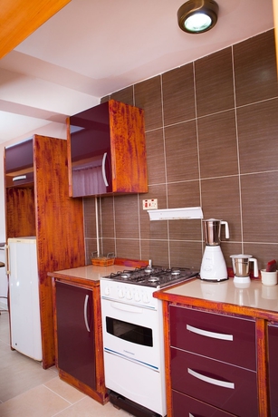 Imagen de la habitación del Hotel Maxwell Court Apartments. Foto 13