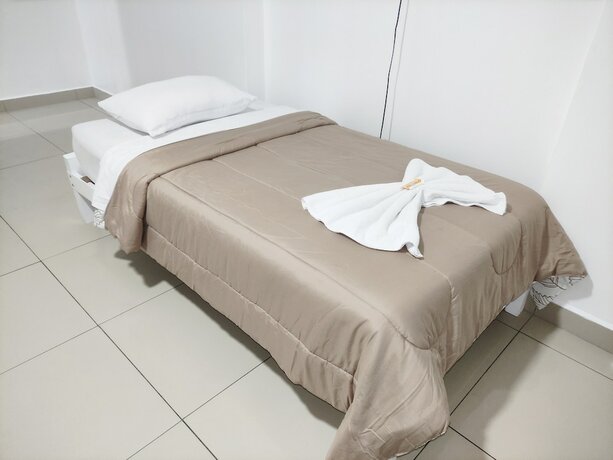 Imagen de la habitación del Hotel Maxy's Inn and Suite. Foto 14