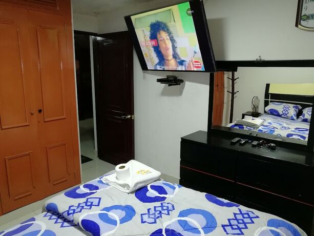 Imagen de la habitación del Hotel Maxy's Inn and Suite. Foto 17