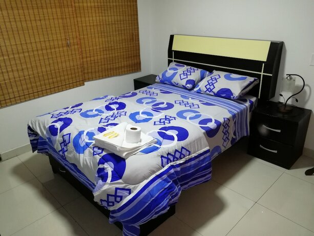 Imagen de la habitación del Hotel Maxy's Inn and Suite. Foto 18