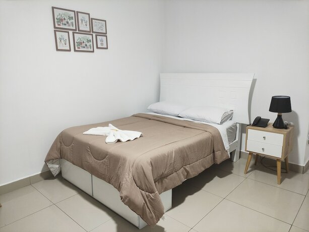 Imagen de la habitación del Hotel Maxy's Inn and Suite. Foto 19