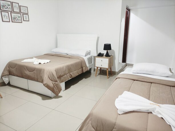 Imagen de la habitación del Hotel Maxy's Inn and Suite. Foto 20