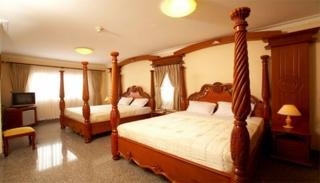 Imagen de la habitación del Hotel May Hotel. Foto 4