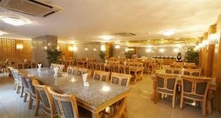 Imagen del bar/restaurante del Hotel May Hotel. Foto 1