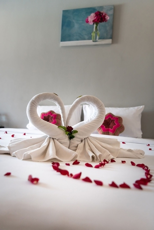 Imagen de la habitación del Hotel May House Karon Beach. Foto 9