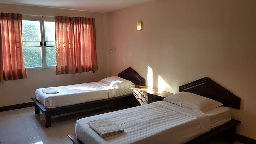 Imagen de la habitación del Hotel May I Inn. Foto 17