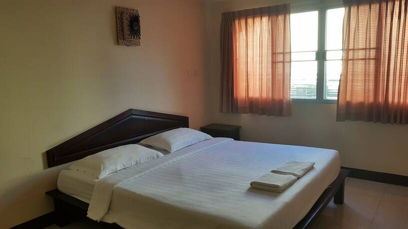 Imagen de la habitación del Hotel May I Inn. Foto 18