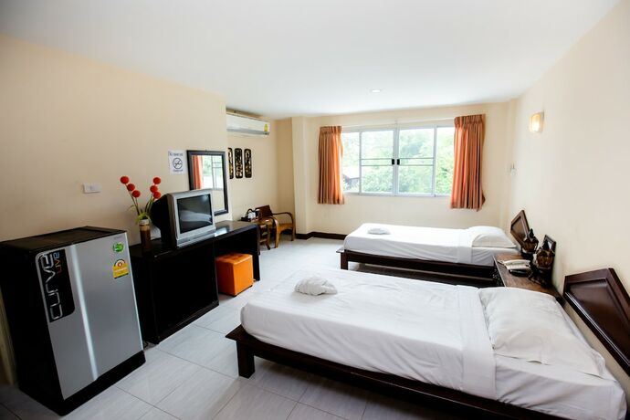 Imagen de la habitación del Hotel May I Inn. Foto 19