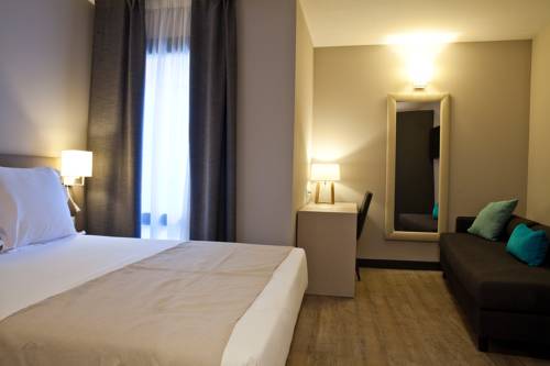 Imagen de la habitación del Hotel May Ramblas. Foto 6