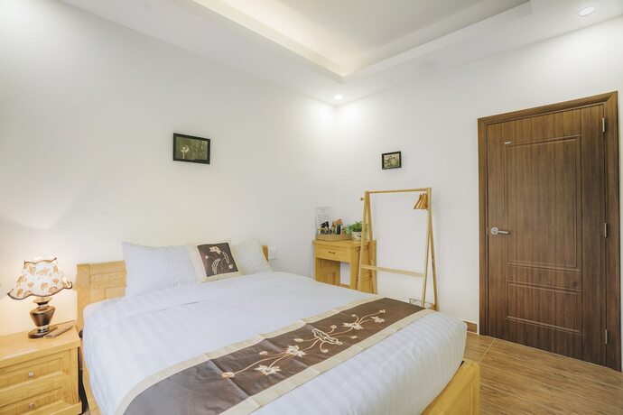 Imagen de la habitación del Hotel May Trang Villa. Foto 14