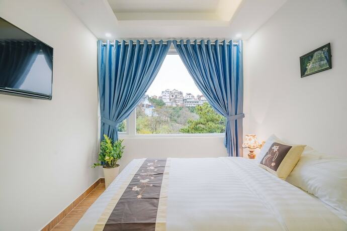 Imagen de la habitación del Hotel May Trang Villa. Foto 15