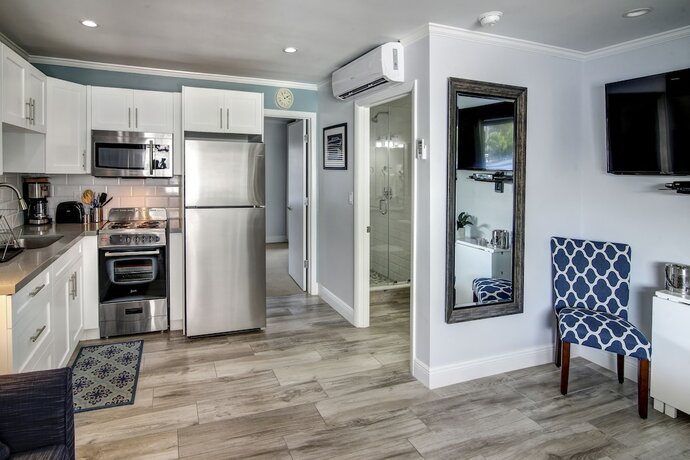 Imagen de la habitación del Hotel May-Dee Suites. Foto 14