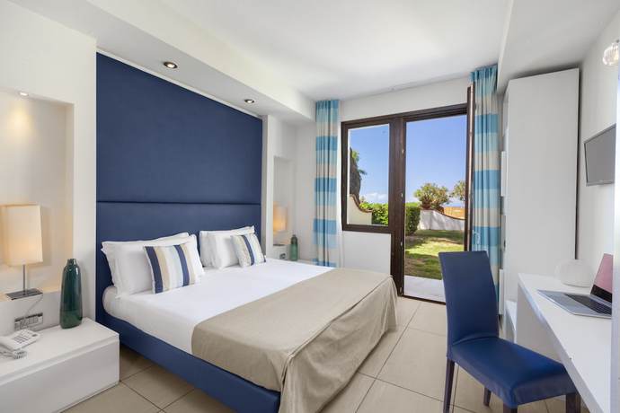 Imagen de la habitación del Hotel Maya Beach Resort. Foto 15