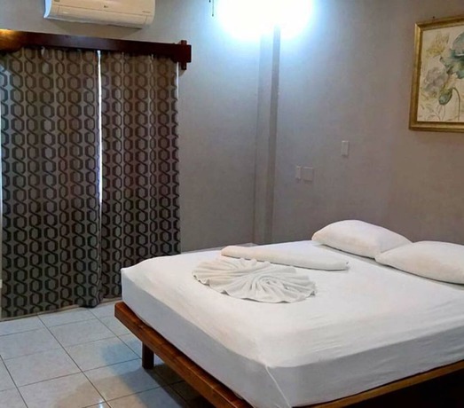 Imagen de la habitación del Hotel Maya Bella Downtown. Foto 9