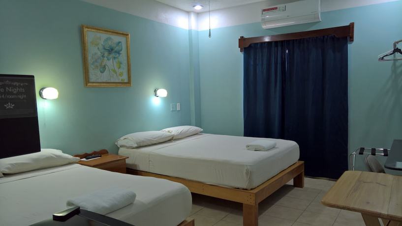 Imagen de la habitación del Hotel Maya Bella Downtown. Foto 12