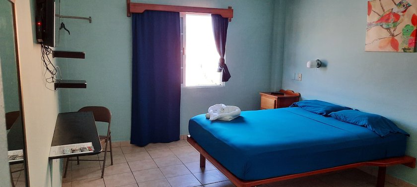 Imagen de la habitación del Hotel Maya Bella Downtown. Foto 14