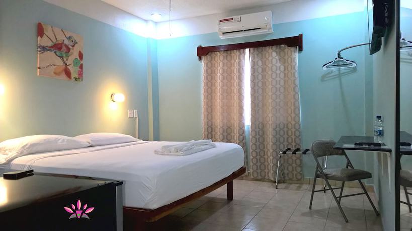 Imagen de la habitación del Hotel Maya Bella Downtown. Foto 17
