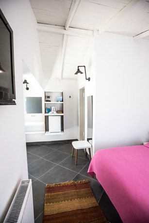 Imagen de la habitación del Hotel Maya Bistro Beach. Foto 15