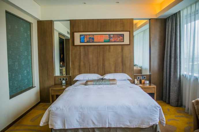 Imagen de la habitación del Hotel Maya Gleetour Wuhan. Foto 3
