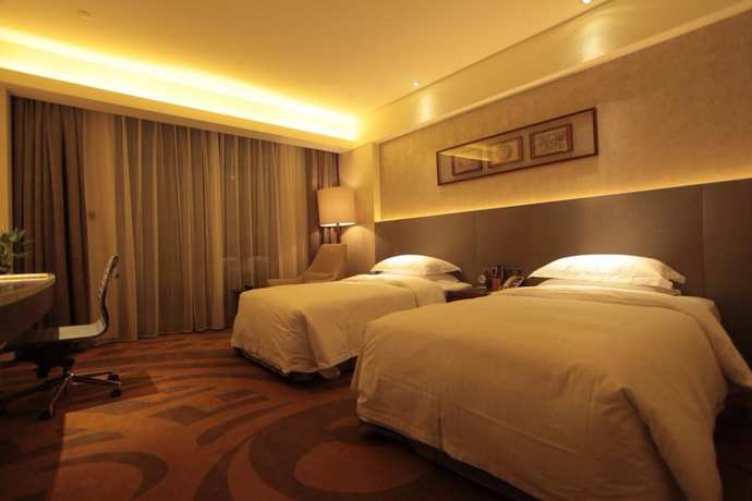 Imagen de la habitación del Hotel Maya Gleetour Wuhan. Foto 6