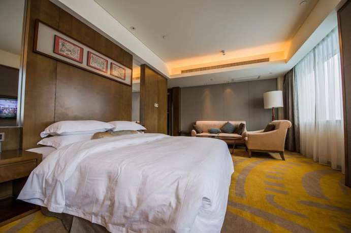 Imagen de la habitación del Hotel Maya Gleetour Wuhan. Foto 7