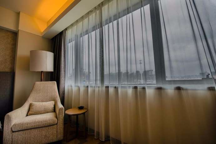 Imagen de la habitación del Hotel Maya Gleetour Wuhan. Foto 10