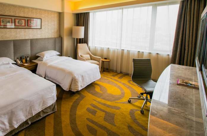 Imagen de la habitación del Hotel Maya Gleetour Wuhan. Foto 13