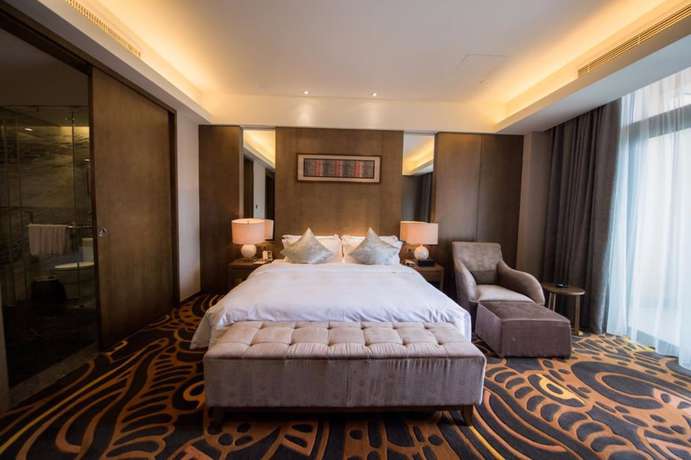 Imagen de la habitación del Hotel Maya Gleetour Wuhan. Foto 16