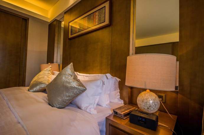 Imagen de la habitación del Hotel Maya Gleetour Wuhan. Foto 17
