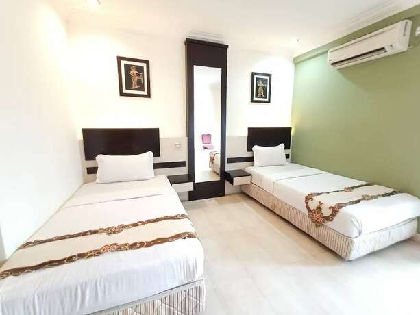 Imagen de la habitación del Hotel Maya, Lahad Datu. Foto 15