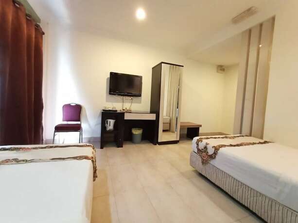 Imagen de la habitación del Hotel Maya, Lahad Datu. Foto 27