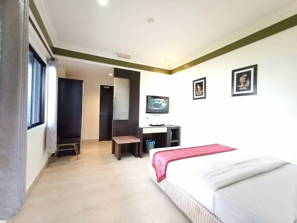 Imagen de la habitación del Hotel Maya, Lahad Datu. Foto 30