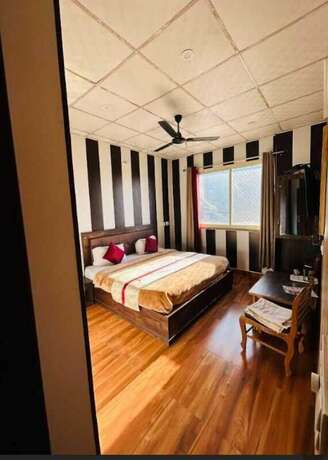 Imagen de la habitación del Hotel Maya, Mussoorie. Foto 18