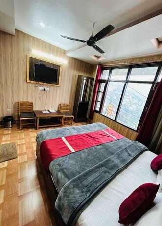 Imagen de la habitación del Hotel Maya, Mussoorie. Foto 19