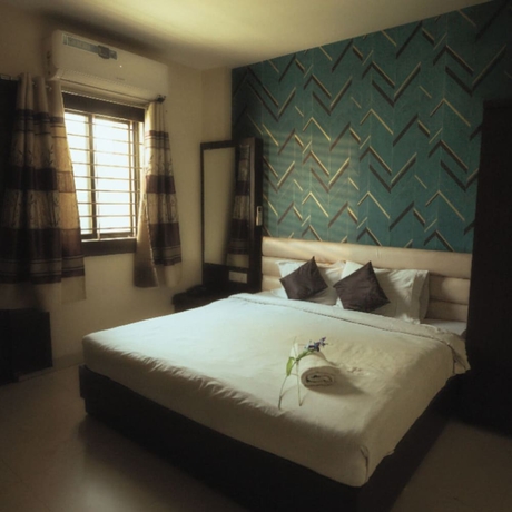 Imagen de la habitación del Hotel Maya Palace, Bhopal. Foto 5