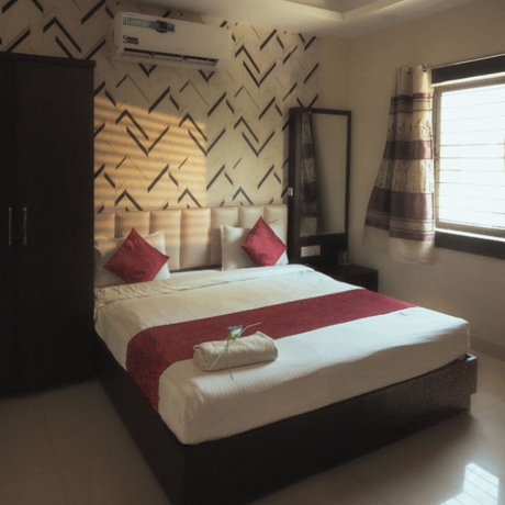 Imagen de la habitación del Hotel Maya Palace, Bhopal. Foto 7