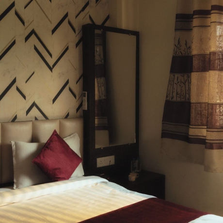 Imagen de la habitación del Hotel Maya Palace, Bhopal. Foto 9