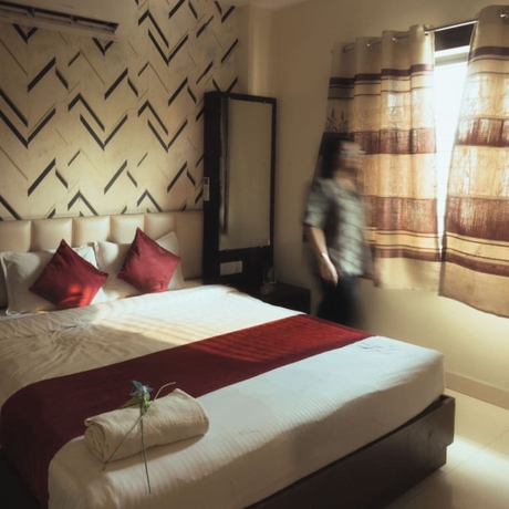 Imagen de la habitación del Hotel Maya Palace, Bhopal. Foto 10