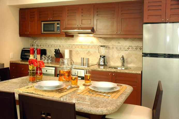 Imagen de la habitación del Hotel Maya Villa Condo and Beach Club. Foto 6