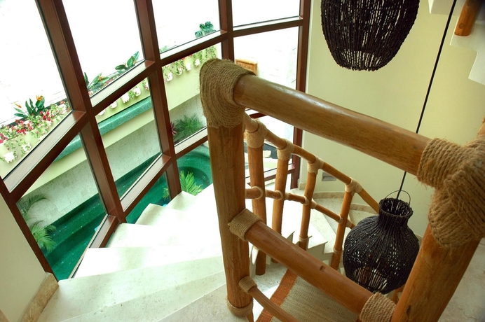 Imagen de la habitación del Hotel Maya Villa Condo and Beach Club. Foto 9